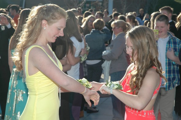 Lizzie and Kaitie compare corsages